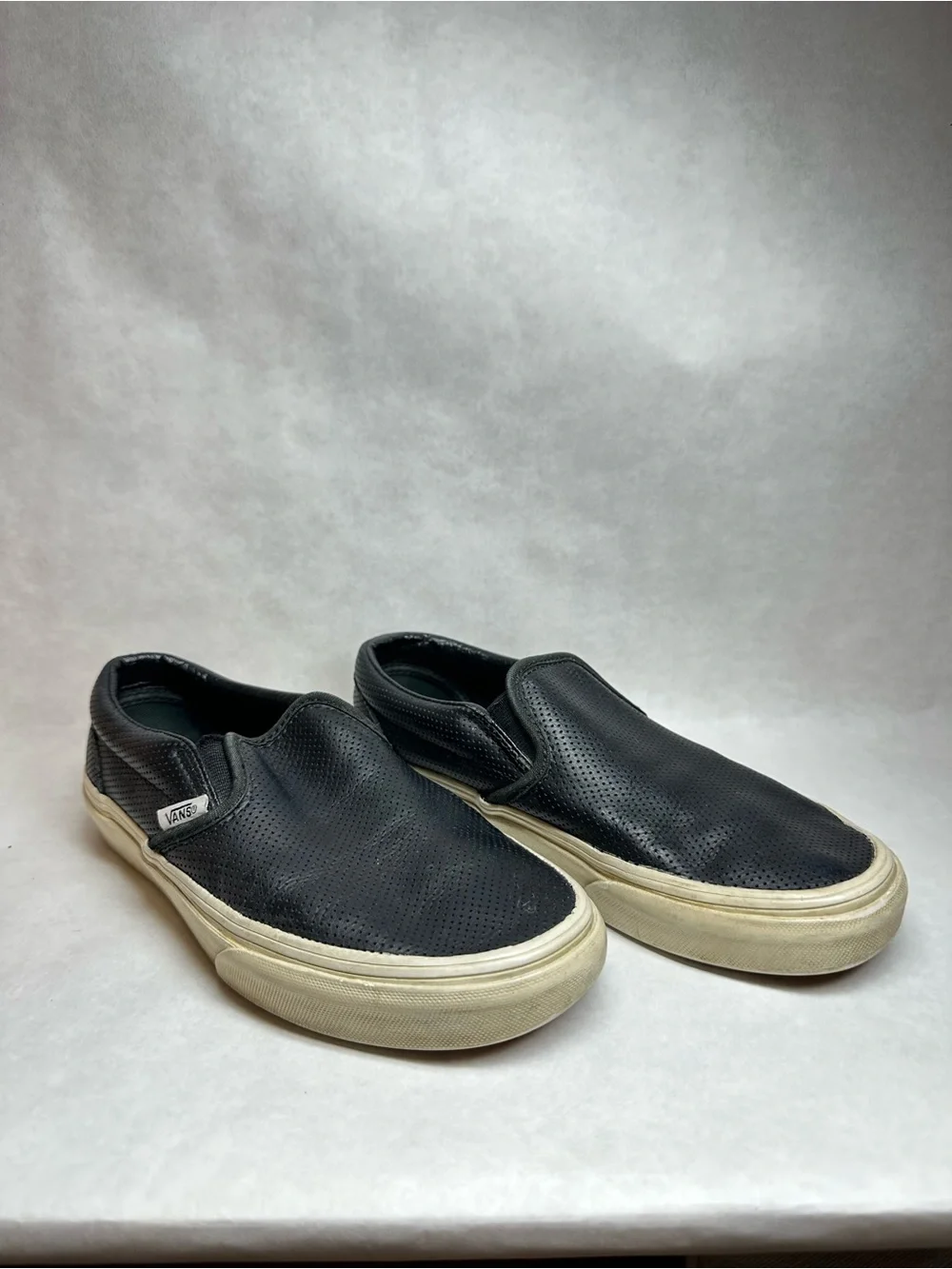 Vans Black Perforated Leather Slip-On Sneakers